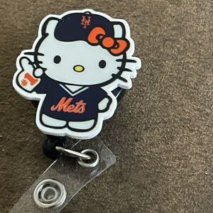 Hello Kitty Mets Badge Reel